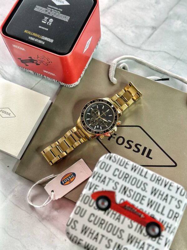 *This 45 mm Fossil Bonson features a black satin dial, chronograph movement and full golden metal strap* ✅ - Image 2