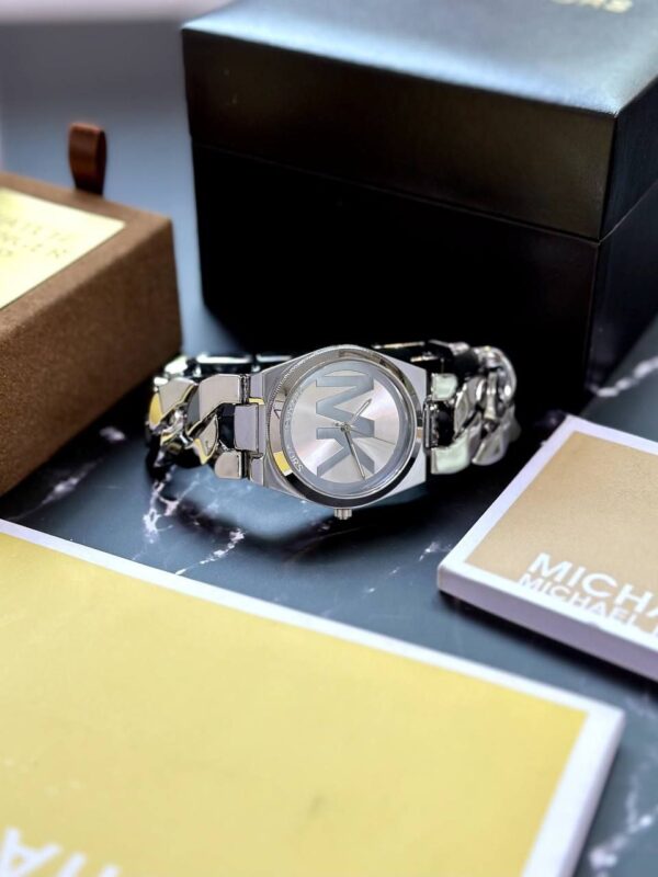 *Perfectly made for outgoing and active ladies, this Michael Kors modern and stylish watch would be a great accessory for you.* ✅ - Image 2